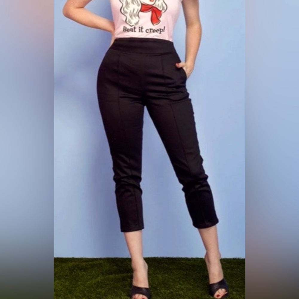 Cropped cigarette trousers in black by Laura Byrnes
